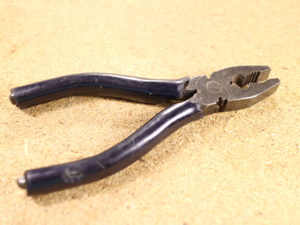 istock pliers and side cutters on the table 971008150