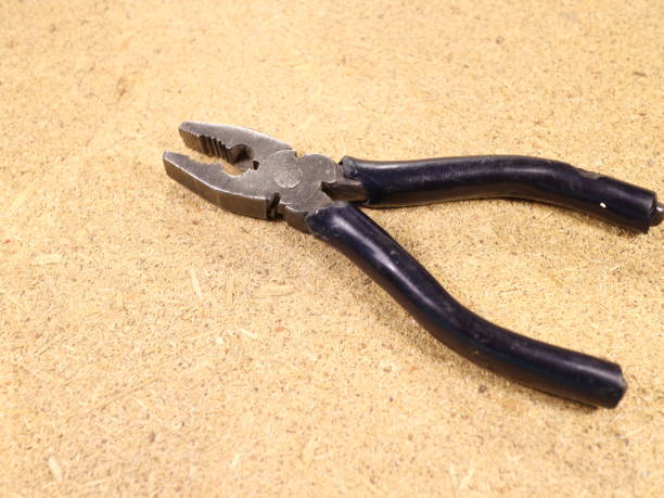 istock pliers and side cutters on the table 971008170