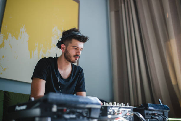 istock Dj Playing Music At House Party 971008244