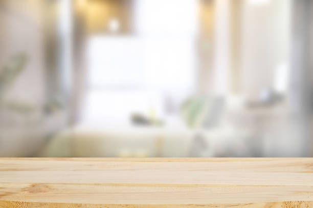 istock Wood table in bed room with blur background. 971008828