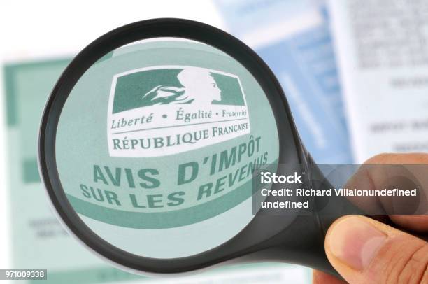 Taxes Under The Microscope Stock Photo - Download Image Now - Tax, France, Magnifying Glass