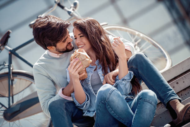 istock Happy young couple hugging outdoors 971011880