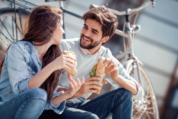 istock Happy young couple hugging outdoors 971011918