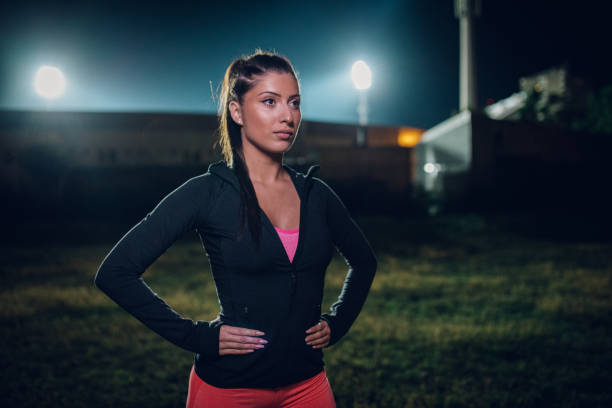istock Sporty woman at night 971012880