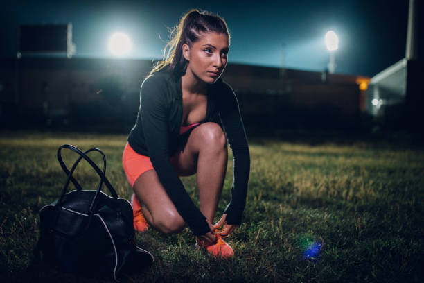 istock Woman tying shoelace 971015782