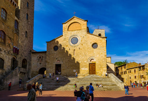 Basilica della collegiata of Santa Maria Assunta in San Gimignano (Siena, Italy). stock photo