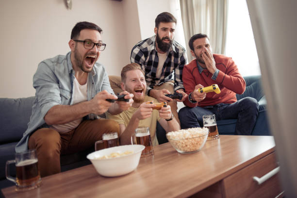 istock Group of friends playing video games 971019172