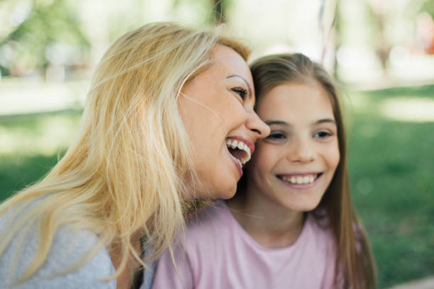 istock Mother and daughter smiling 971019184