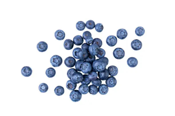 Photo of Heap of blueberries, fresh berries, isolated on white background, top view