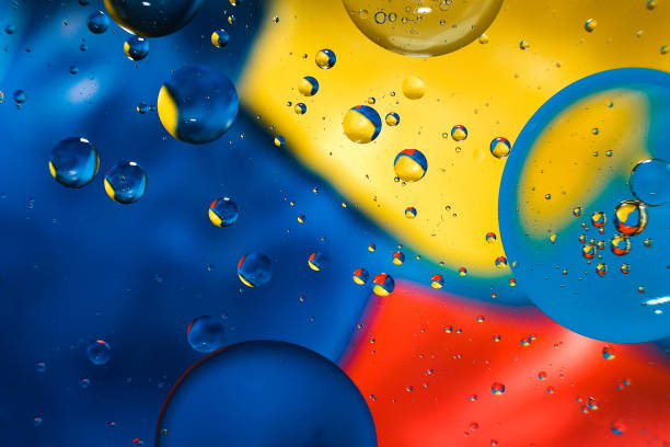istock colorful background from water drops 971035096