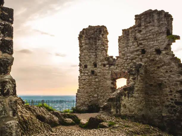 Ruined wall of Drachenfels castle in Königswinter, Germany during sunset