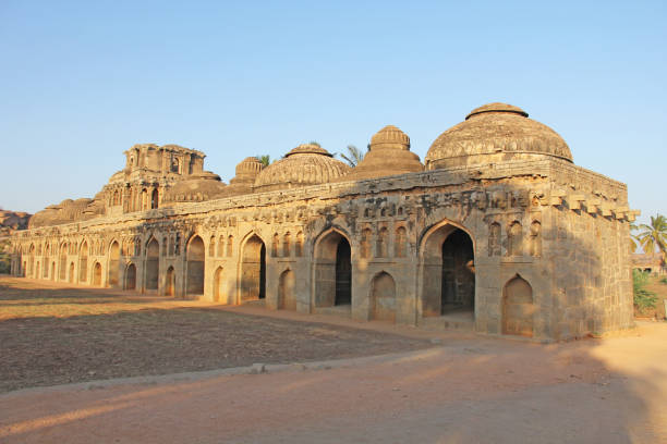 istock Elephant Stables. Garage or parking for royal elephants. Hampi Monuments, Karnataka, India 971043028