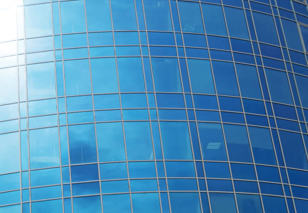 istock Modern round office building with square windows. 971043120