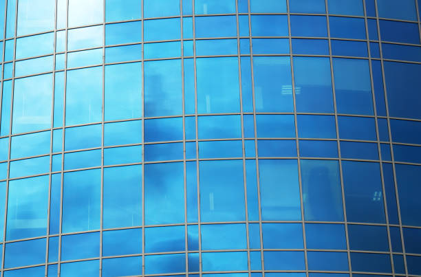 istock Modern round office building with square windows. 971043248