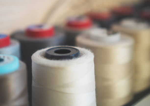 istock A collection of sewing threads. Close-up view. 971043296