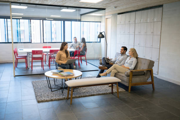 istock Group of people working together at a co-working space 971043544