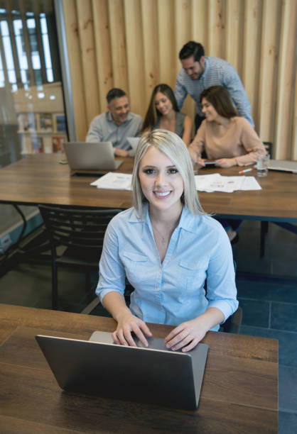istock Business woman working online at a co-working space 971043634