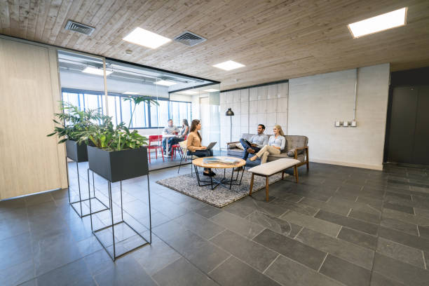 istock Group of people working together at a co-working space 971043640