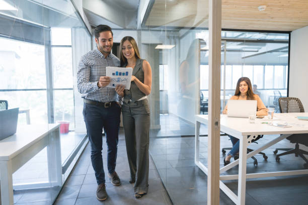 istock Business partners working together at the office 971043654