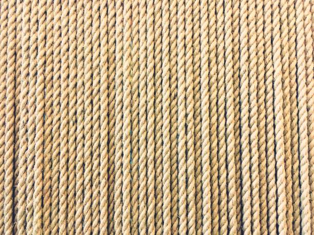 istock natural rope texture, beige twine, vertical arrangement 971047916