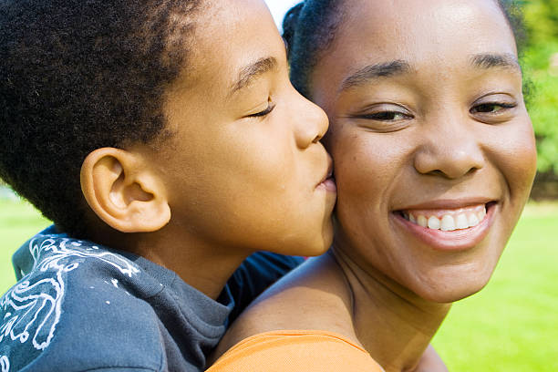 istock son kissing mother 97105059