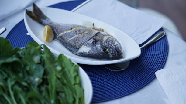istock tasty fish standing on a plate 971057486