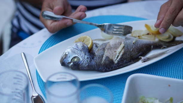 istock tasty fish standing on a plate 971057518