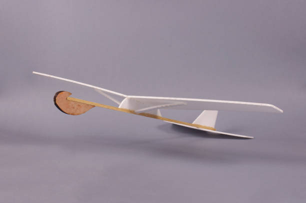 istock DIY foam board plane isolated on the gray background 971057582