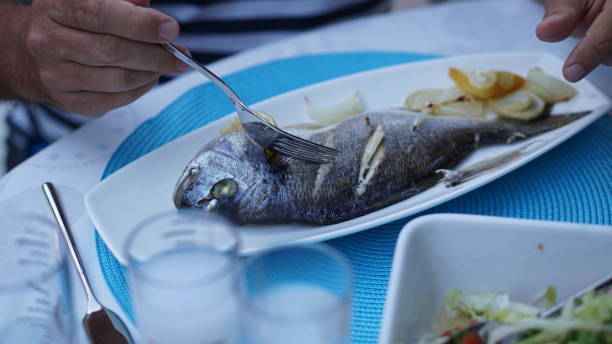 istock tasty fish standing on a plate 971057588