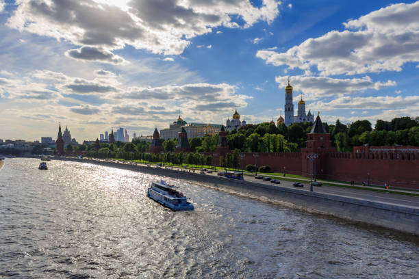 Moscow, Russia - May 27, 2018: Moscow Kremlin and Moskva river against cloudy blue sky in the evening