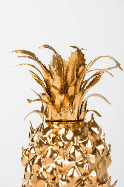 istock one ripe golden pineapple isolated on white 971064852
