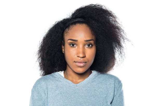 istock Serious young woman on white background 971066962