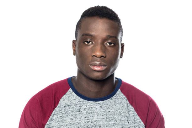 istock Teenage african boy looking at camera 971067190