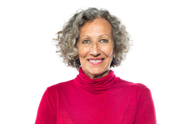 istock Beautiful senior woman smiling on white background 971067192