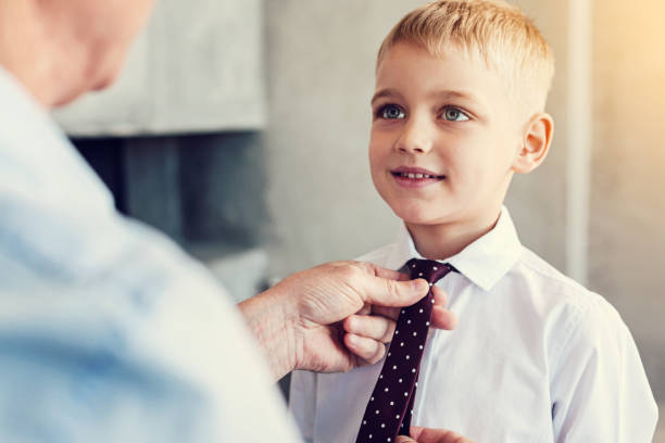 istock Smart little boy wearing a beautiful tie 971067240