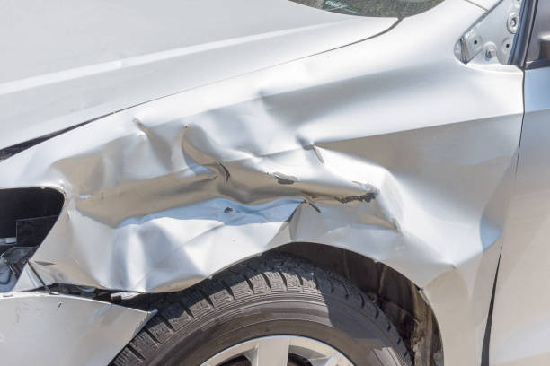 Accident on front of white car isolated on white background with clipping path