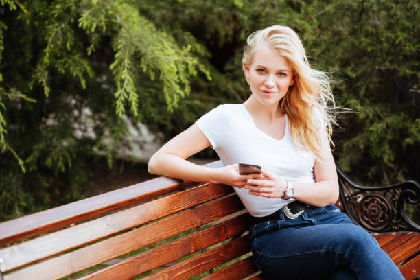 istock Young woman, against green background 971070264