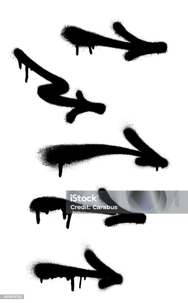 Graffiti arrows set with overspray in black over white. Sprayed arrows icon set with overspray in black over white. Graffiti vector illustration. Spray Paint stock vector