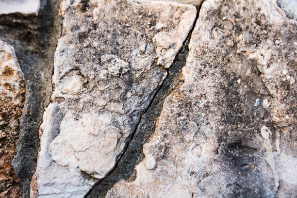 istock Close up of natural stone wall. Stone wall texture 971086690
