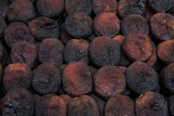 sol damasco seco - dried apricot close up gourmet dried fruit - fotografias e filmes do acervo