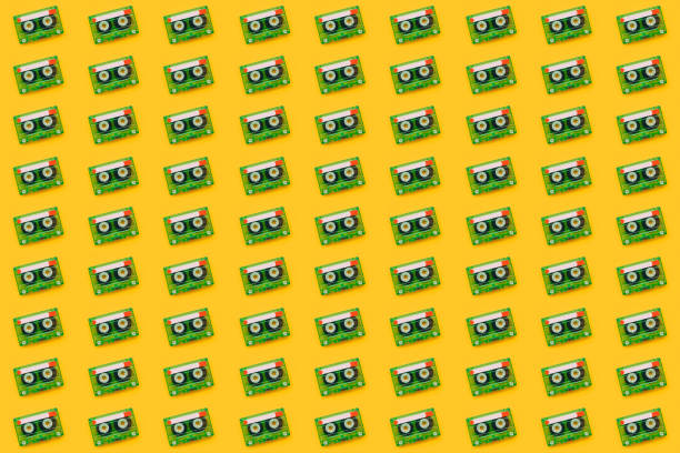 istock Seamless pattern background of audio cassettes 971106828