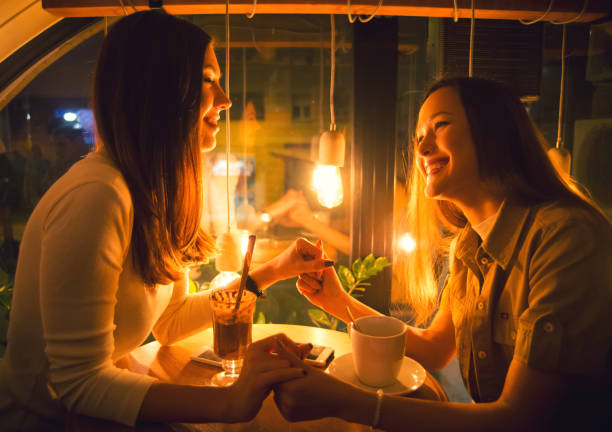 istock Happy girlfriends enjoying night life 971110078