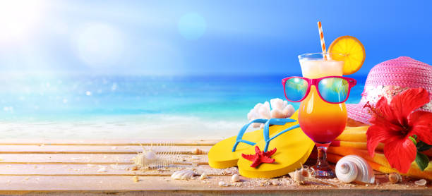 istock Beach Concept - Tequila Sunrise Cocktail With Summer Accessories 971110712