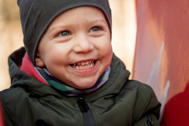 istock baby boy smiling close up 971111162