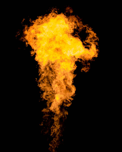 istock Flame tongue goes from gas burner. Isolated fire texture. 971137804