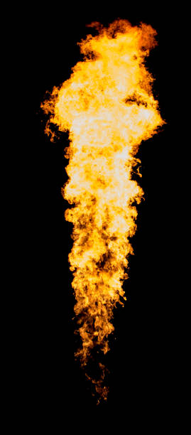 istock Flame pillar. Isolated fire tongue goes from flamethrower. 971137812
