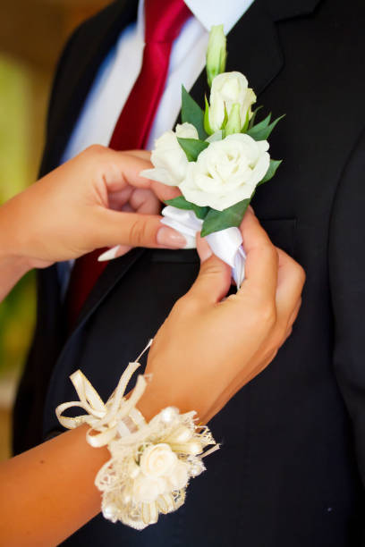 istock wedding flower on groom 971162488