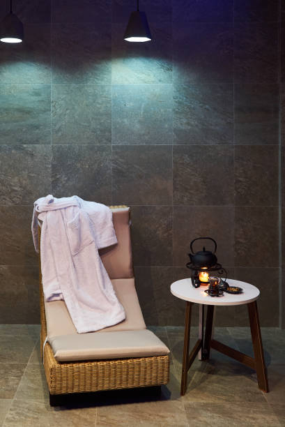 istock Spa and wellness setting with Rolled spa towels 971165634