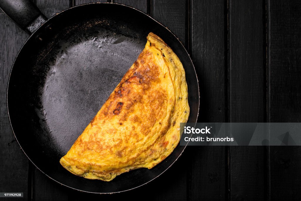 Delicious Classic French Omelet Still On A Cast Iron Pan On Top Of