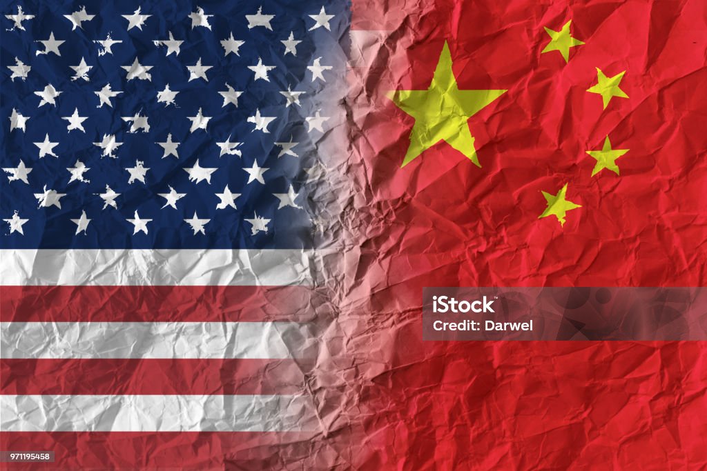 American and Chinese flags on crumpled paper, diplomatic crisis China - East Asia Stock Photo